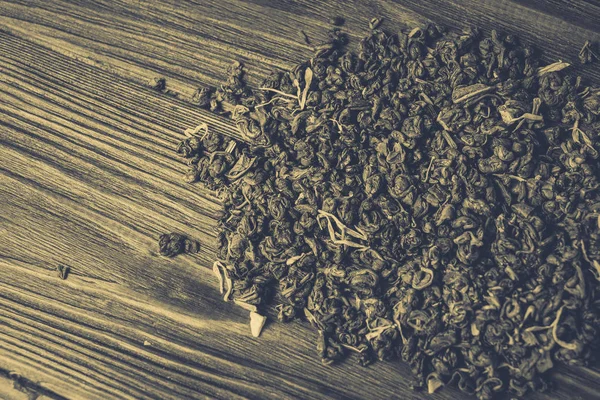 Tè verde su uno sfondo di legno — Foto Stock