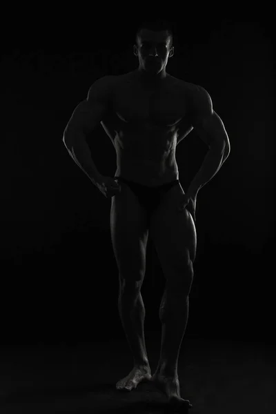 Male showing muscles — Stock Photo, Image