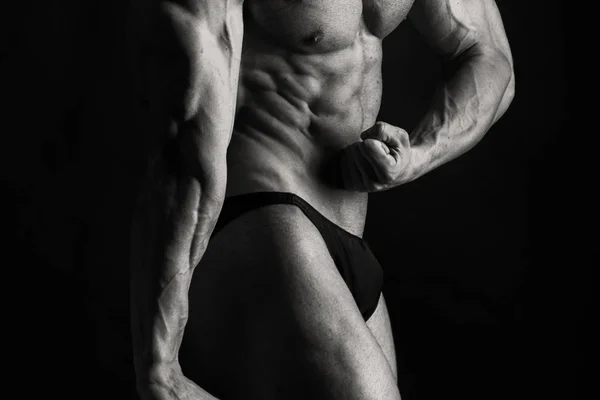 Bodybuilder on black background — Stock Photo, Image
