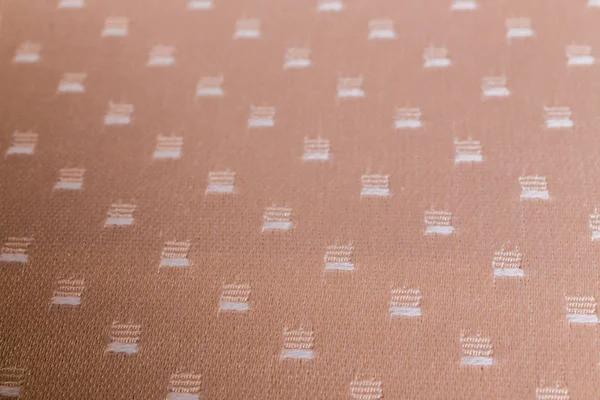 beige cloth with a pattern