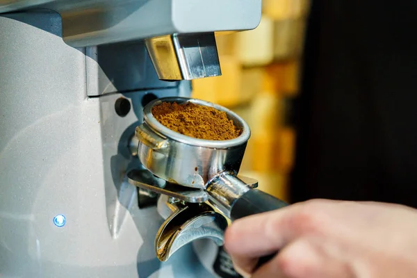 make coffee in the coffee machine