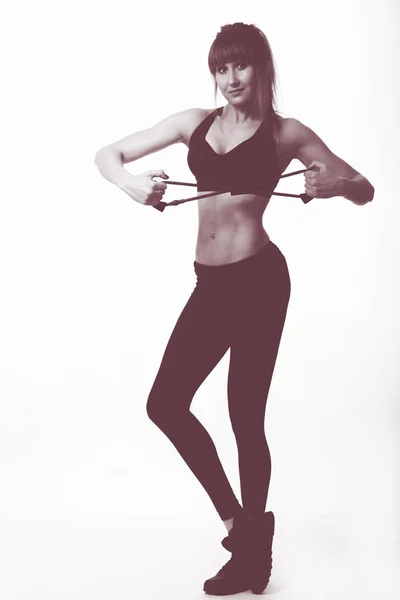 Donna esercizio con elastici per lo sport — Foto Stock