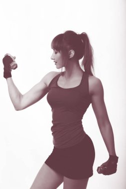 dambıllı bir spor figürü ile kız