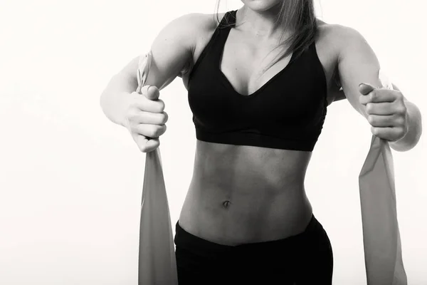 Sports girl with elastic bands — Stock Photo, Image