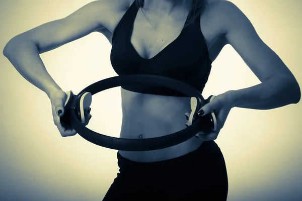 Girl with a sports figure with dumbbells — Stock Photo, Image