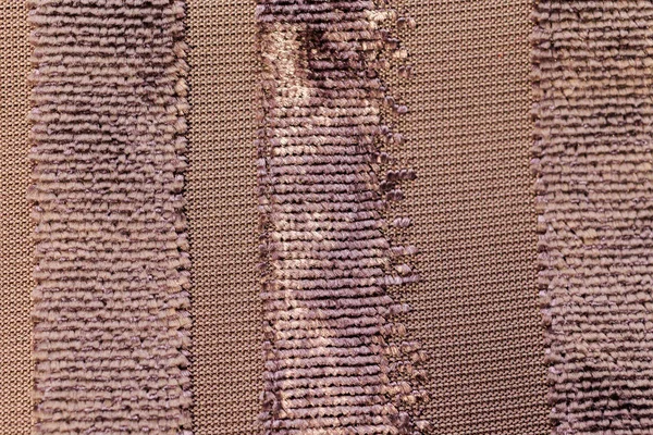 Tecido marrom com um padrão — Fotografia de Stock