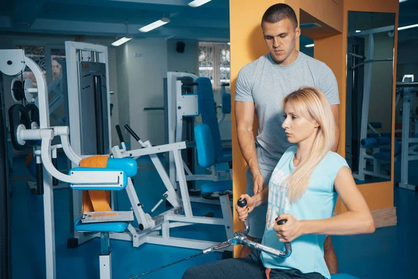 Personal training in the gym Stock Picture