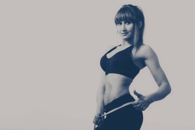 santimetre ile atletik kız