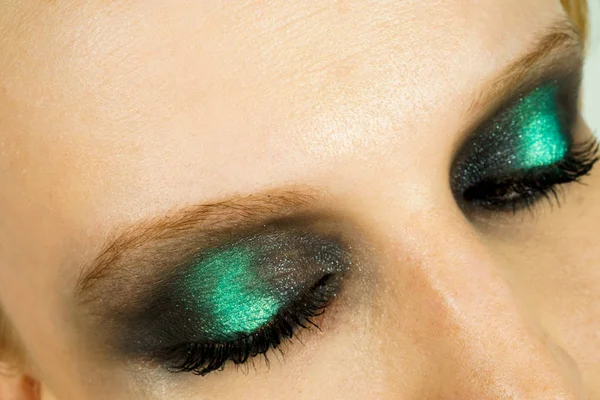 Makeup with green shadows