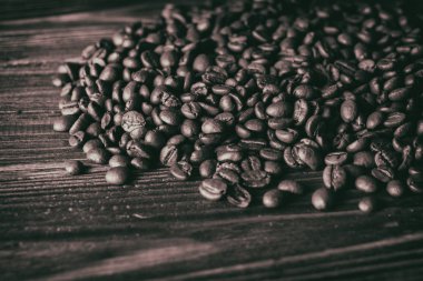 Tablo arka plan üzerinde kahve çekirdekleri