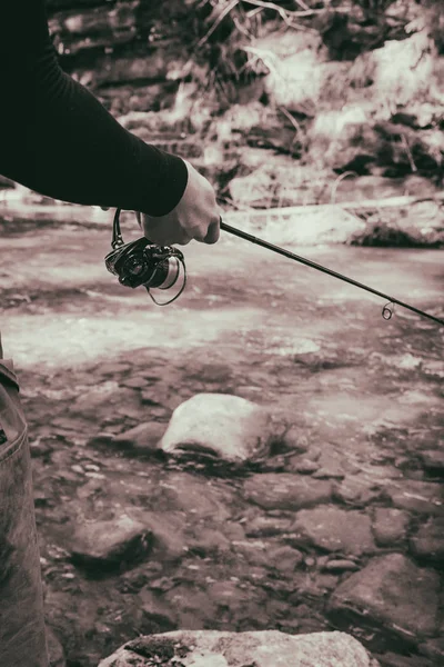 Fisherman on a beautiful mountain river in the forest — Stock Photo, Image