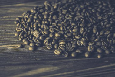 Tablo arka plan üzerinde kahve çekirdekleri