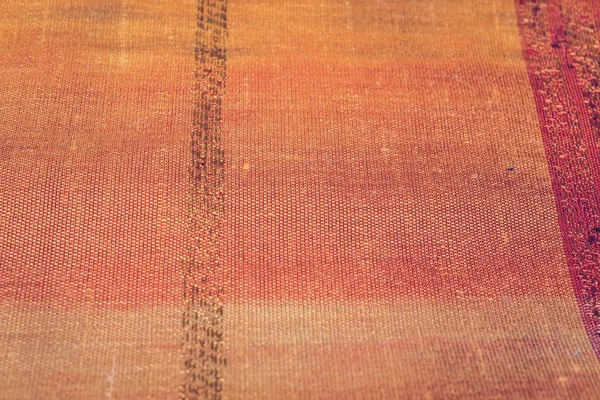 Texturen av rött tyg — Stockfoto