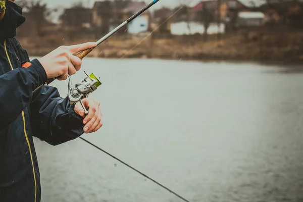 Pike fishing on the lake. Fishing recreation