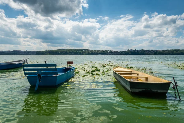 Beautiful urban lake boats nature background