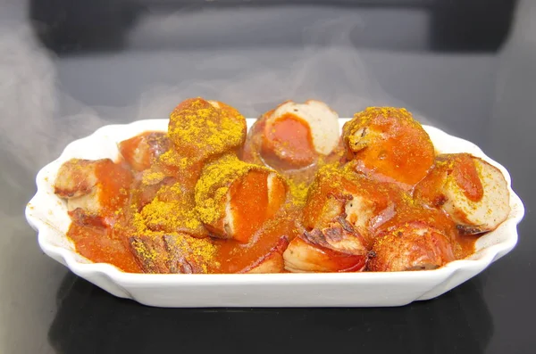 Porzione Currywurst Mit Topping Immagine Stock