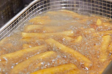 Frittieren von Pommes Frites