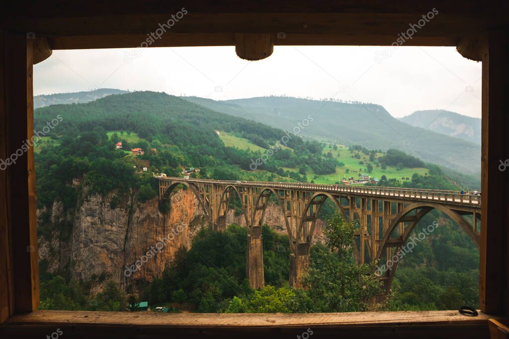 Old big bridge in Durdevica and fantastic view Tara river gorge - is the biggest one canyon in Europe in the national park Durmitor, Montenegro. Balkans. Beauty world.