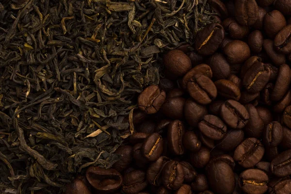 Background of tea leaves. Black and green tea and coffee beans — Stock Photo, Image