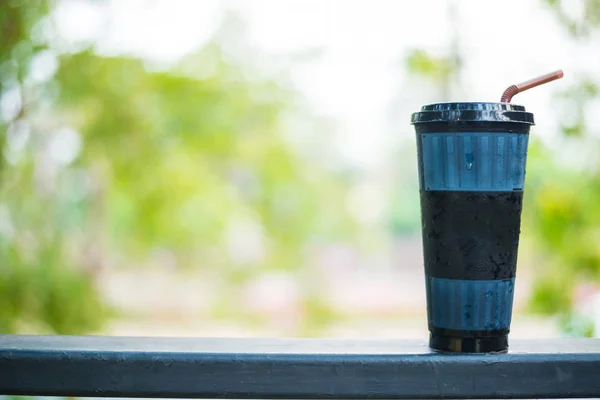 Ice Black Coffee Plastic Glass — Stock Photo, Image