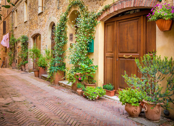 Captivating narrow street of old Pienza town in Tuscany