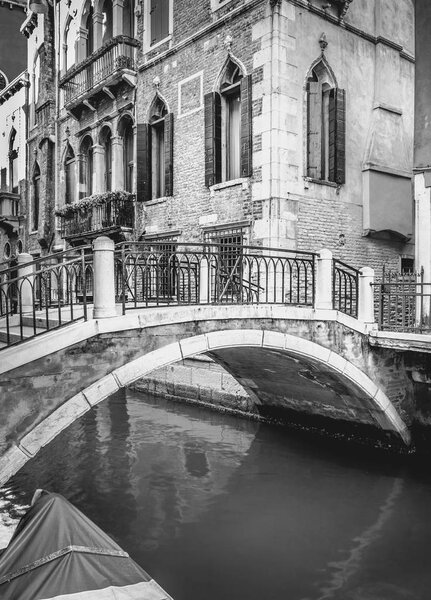 B&W scene from Venice with beautiful bridge in the foreground
