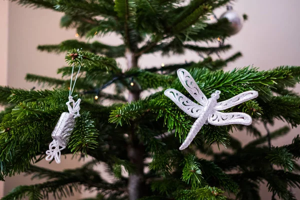 Minimalist decorations of Christmas tree closeup