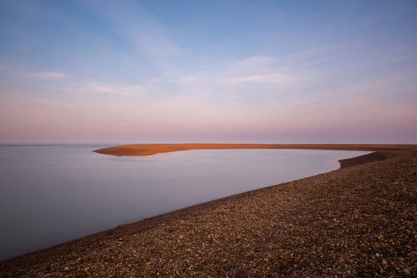 A long exposure of the clouds and water at Shingle Street in Suffolk — Stock Photo, Image