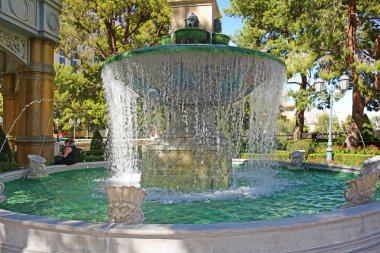 Las Vegas NV, USA 09-30-17: The Bellagio hotel is a symbol of elegance and architecture in the center of the Las Vegas strip. This water fountains adorns the entrance of the hotel lobby