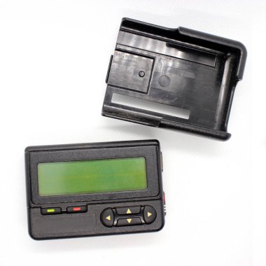 Motorola sunulduğunu alfa-sayısal çağrı cihazı / çağrı cihazı - Vintage - 2 parça - çağrı cihazı ve tutucu 