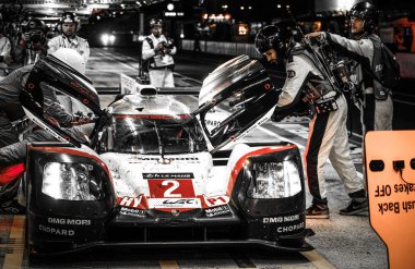Le Mans / France - June 13-14 2017: 24 hours of Le Mans Porsche team LMP1 at pit stop for driver change clipart