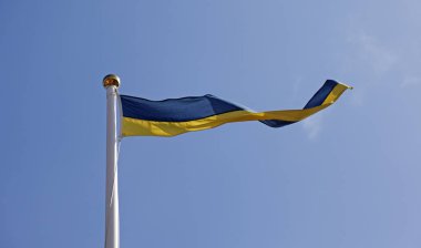 Umea bayrak direğinde pennant olarak İsveç bayrağı