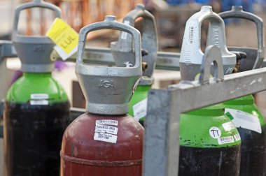 Umea, Norrland Sweden - April 8, 2020: different types of gas bottles for welding and construction