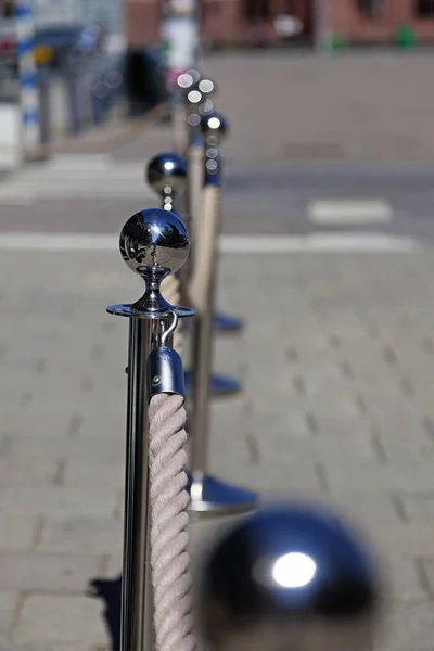 silver bullet rope that divides guests into a nightclub