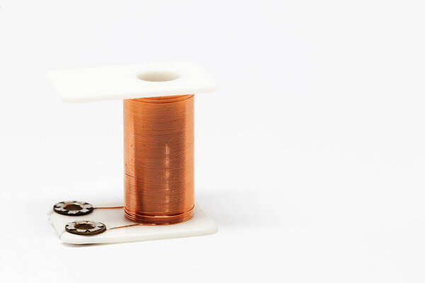 a coil with copper wire that forms part of an electric magnet