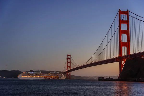 The Golden Gate Bridge in San Francisco at sunset, evening, twilight, photographed from Horseshoe bay, in Marin County, near Fort Baker.