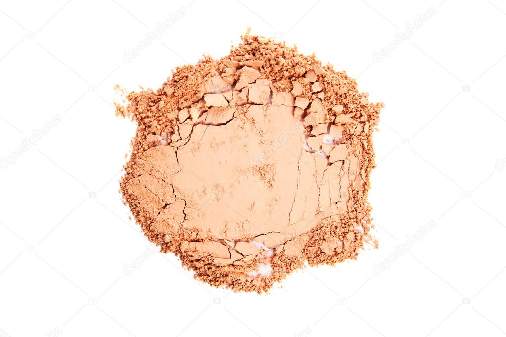 Crumbled natural powder make up on white background.