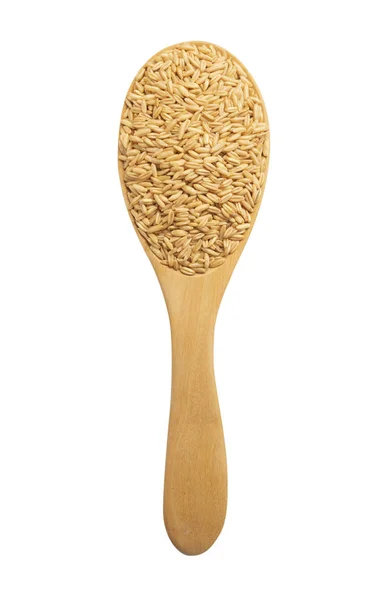 白い背景に分離された木製のスプーンで茶色の麦粒 — ストック写真