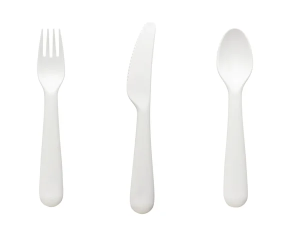 Sada bílé plastové lžíce, vidlice a nože izolované na bílém BAC — Stock fotografie