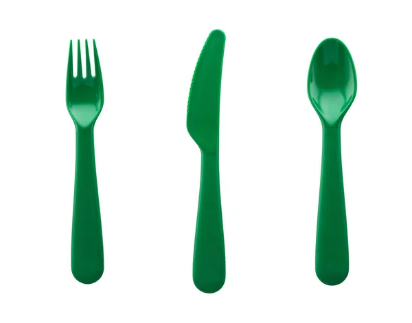 Набор из зеленой пластиковой ложки, вилки и ножа изолированы на белом берегу — стоковое фото