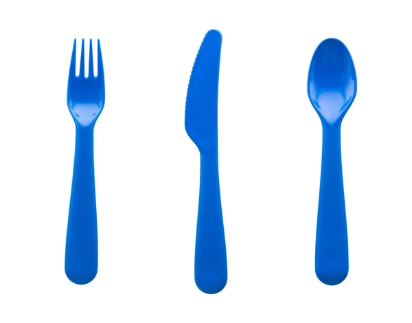 Sada modrých plastových lžičky, vidlice a nože izolované na bílém zadním — Stock fotografie