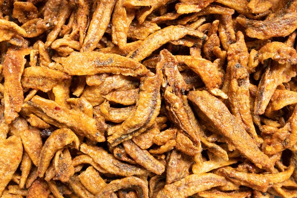 Pequeno peixe de anchova frito, comida tailandesa — Fotografia de Stock