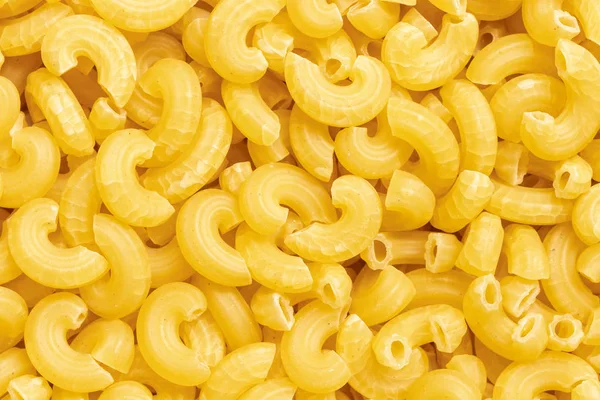 Top view of raw macaroni pasta food for background — Stock Photo, Image