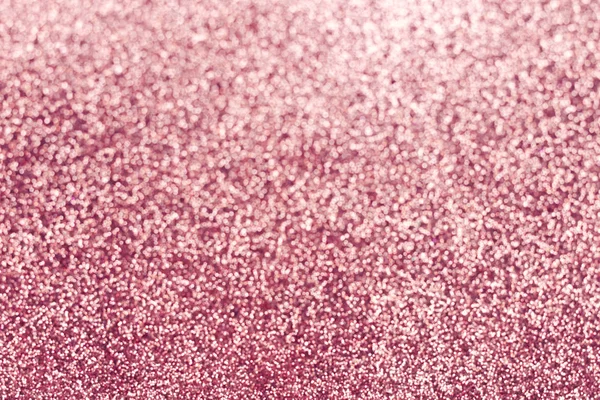 Abstract pink glitter background. Sparkle pink bokeh background.