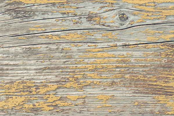 Textura de madeira rústica ou fundo com tinta amarela. Fechar . — Fotografia de Stock