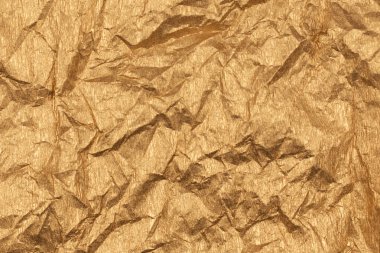 Altın kağıt doku veya arka plan. 