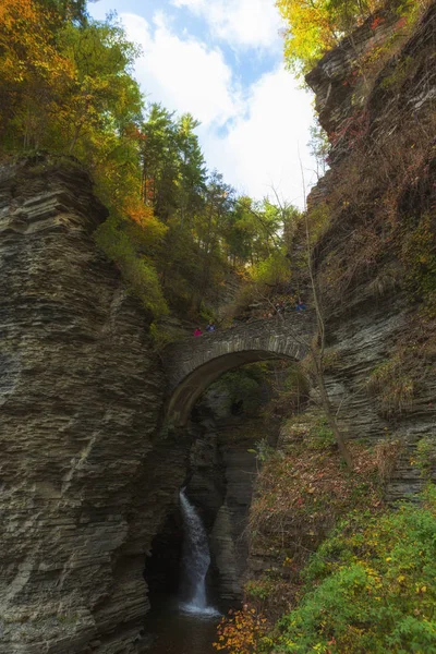 Watkins Glen State Park, located in Watkins Glen, in the Finger Lakes Region of New York State, is a popular travel destination in the autumn season as the leaves change from green to yellow and red.