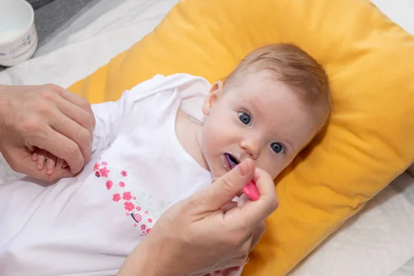 Cute Little Baby Girl Lying Bed Eating Rice Soup Spoon — Stock Photo, Image