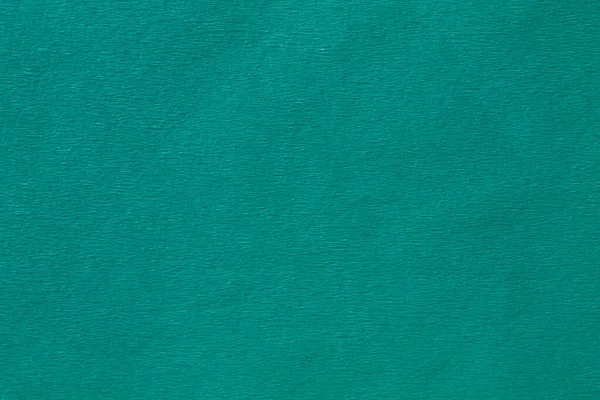 Turkuaz renkli krep kağıdının arkaplanı kapat
