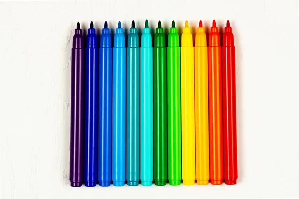 Bright Colored Markers Caps Lie White Wooden Table — Stock Photo, Image